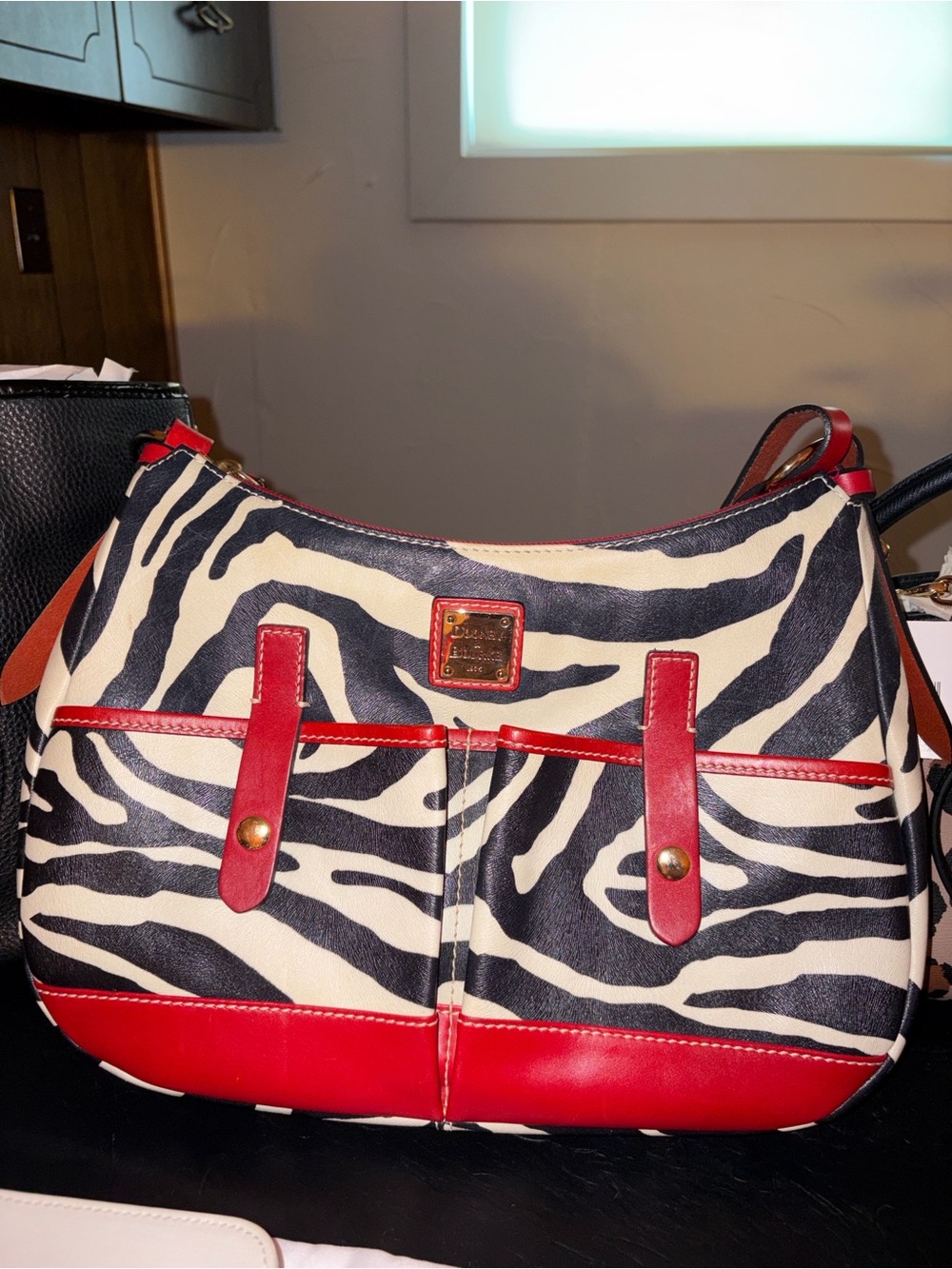 Dooney & Bourke Black and White Zebra-Print Shoulder Bag with Red Trim